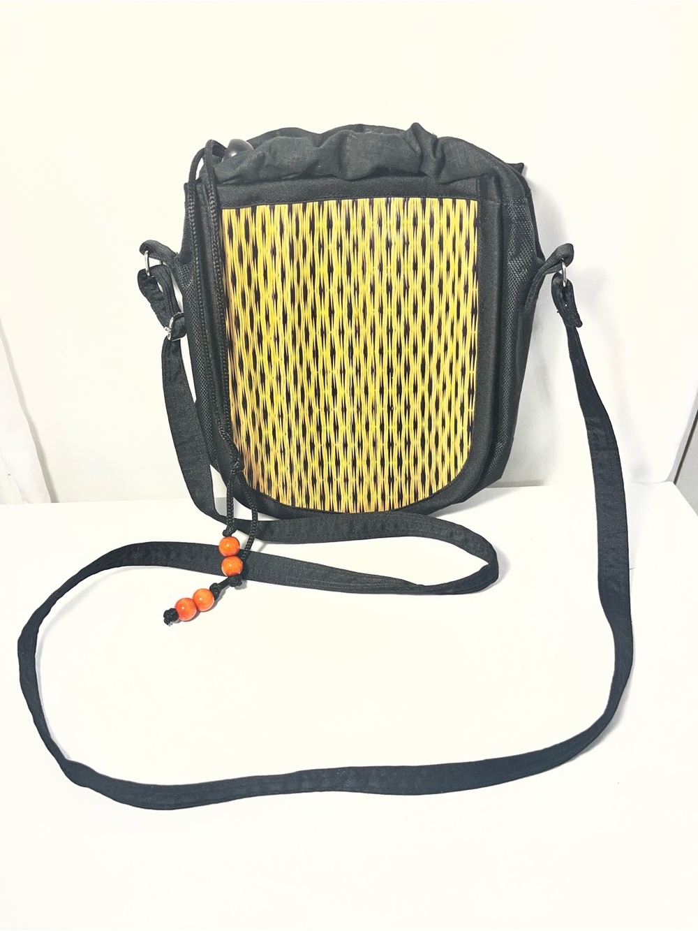 Black and Yellow Crossbody Bag with Orange Bead Accent